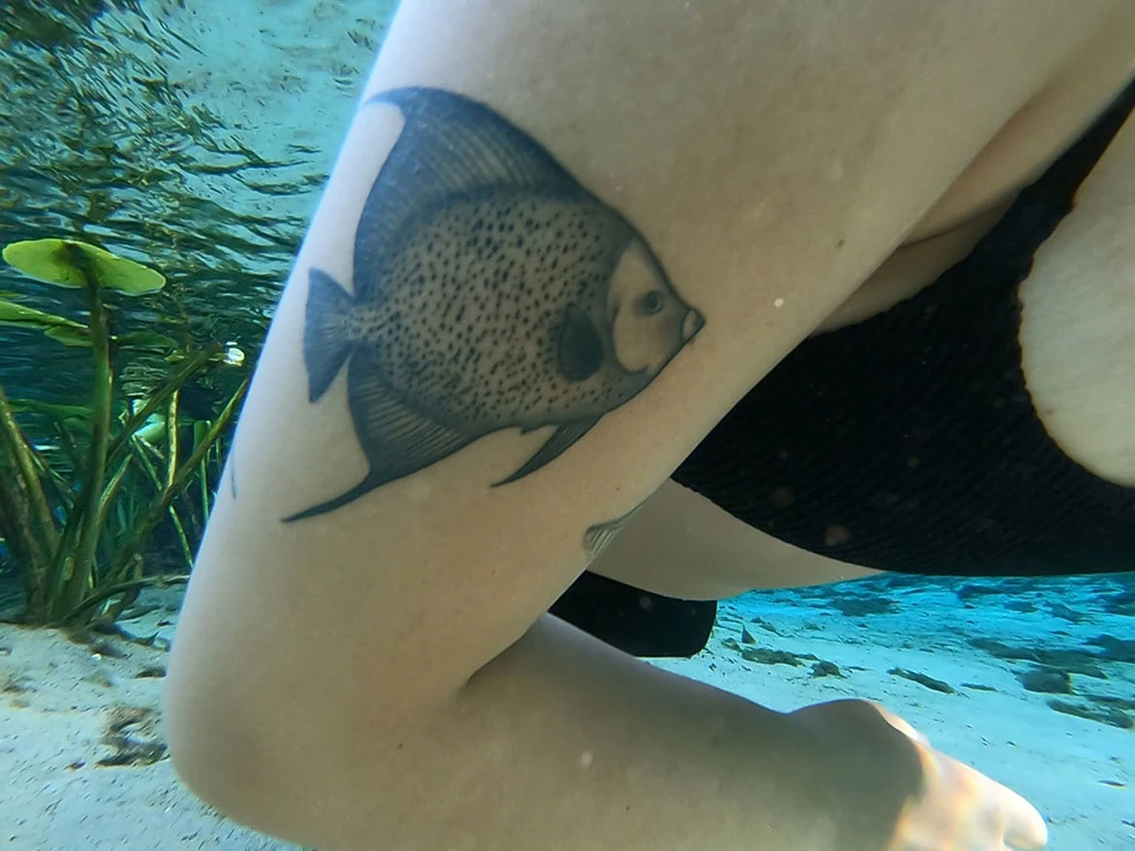 A fish tattoo drawn from one of my sketches, underwater