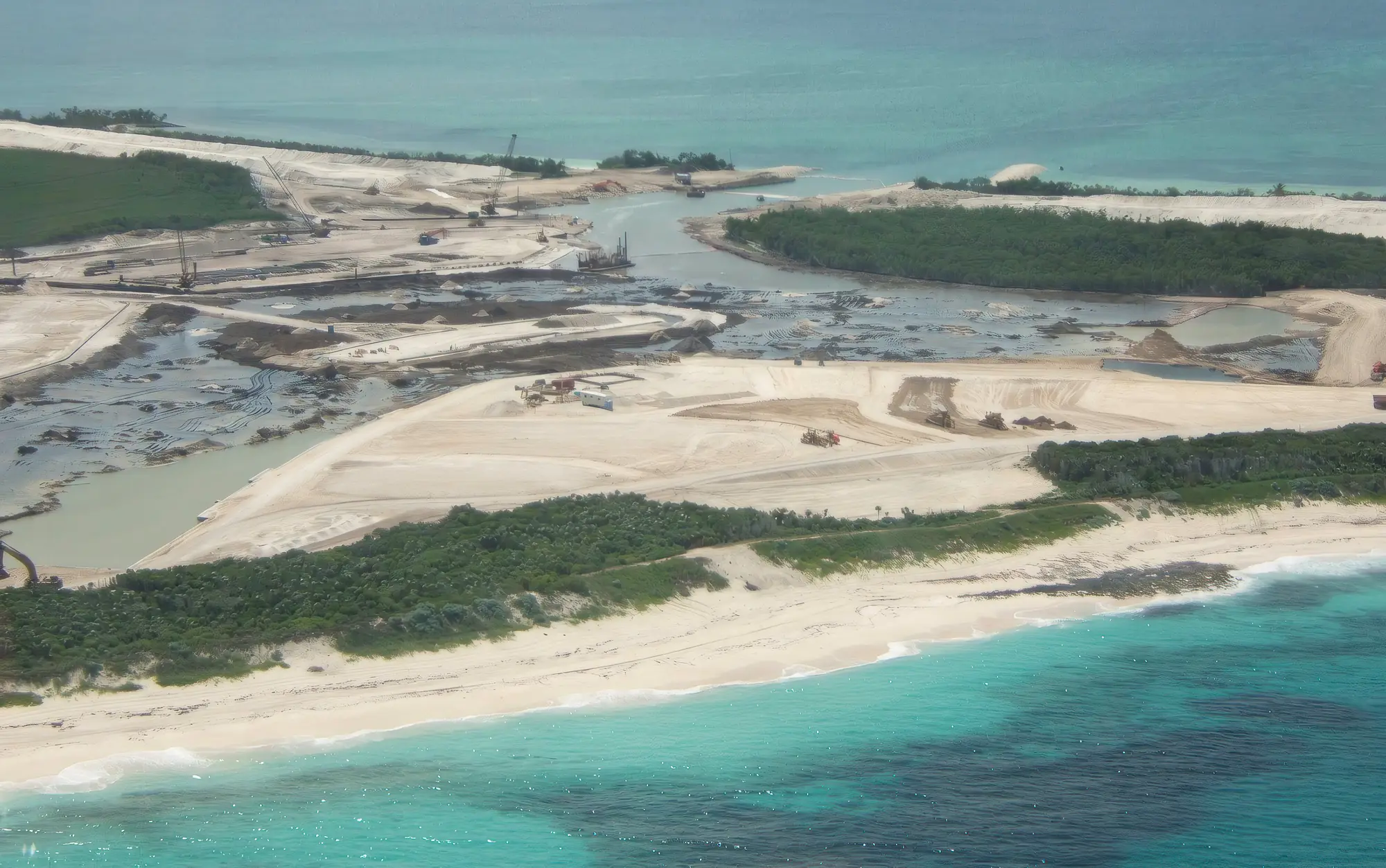 Aerial view of the Bakers Bay marina being dredged out of the mangrove creeks on the north end of Great Guana Cay