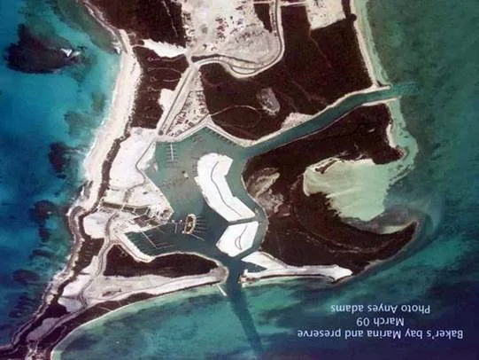 Aerial view of the dredged Baker's Bay marina cut into the island, from the coral reef decline report (March 2009)