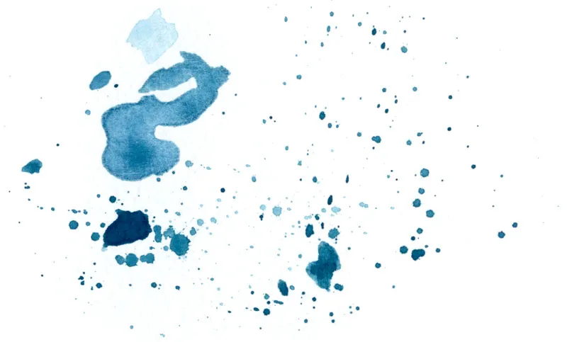 Splatters of cobalt turquoise watercolor paint.