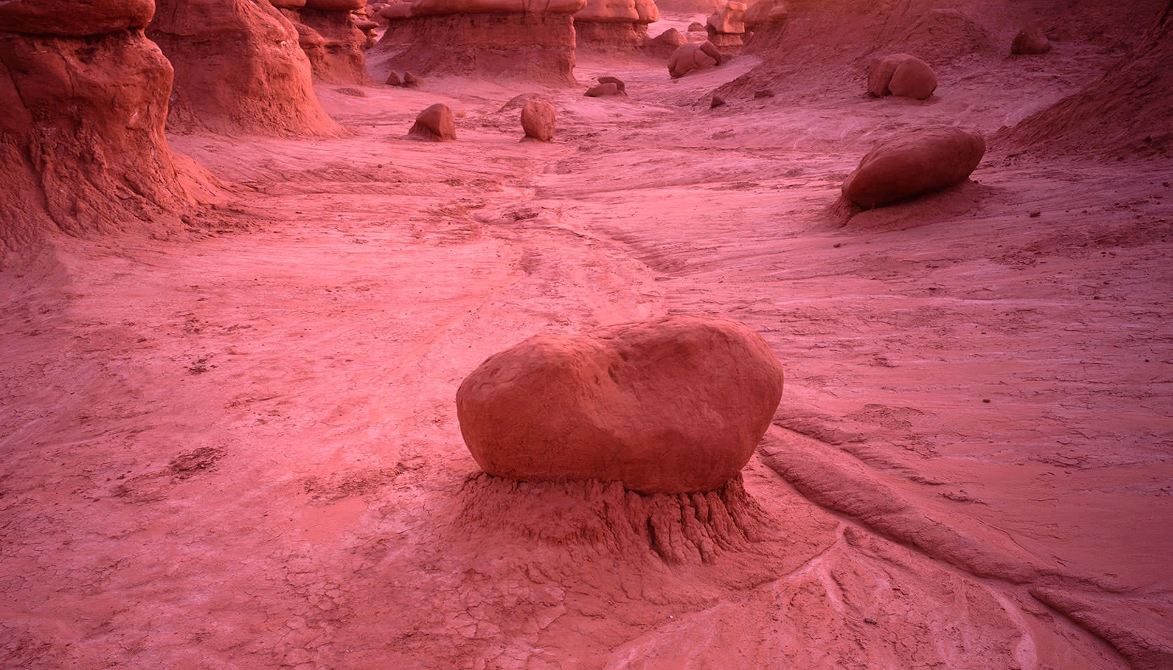 Hoodoo rock formations in Goblin Valley at dusk, Utah
