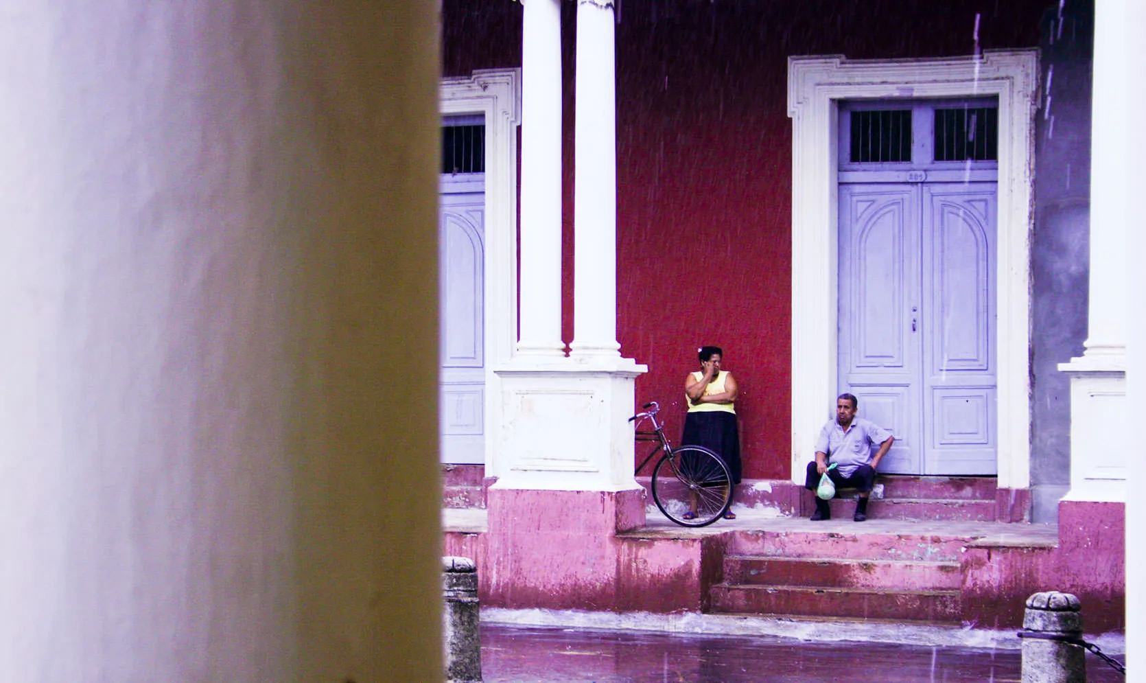 A rainy afternoon on a colonial street in Granada, Nicaragua