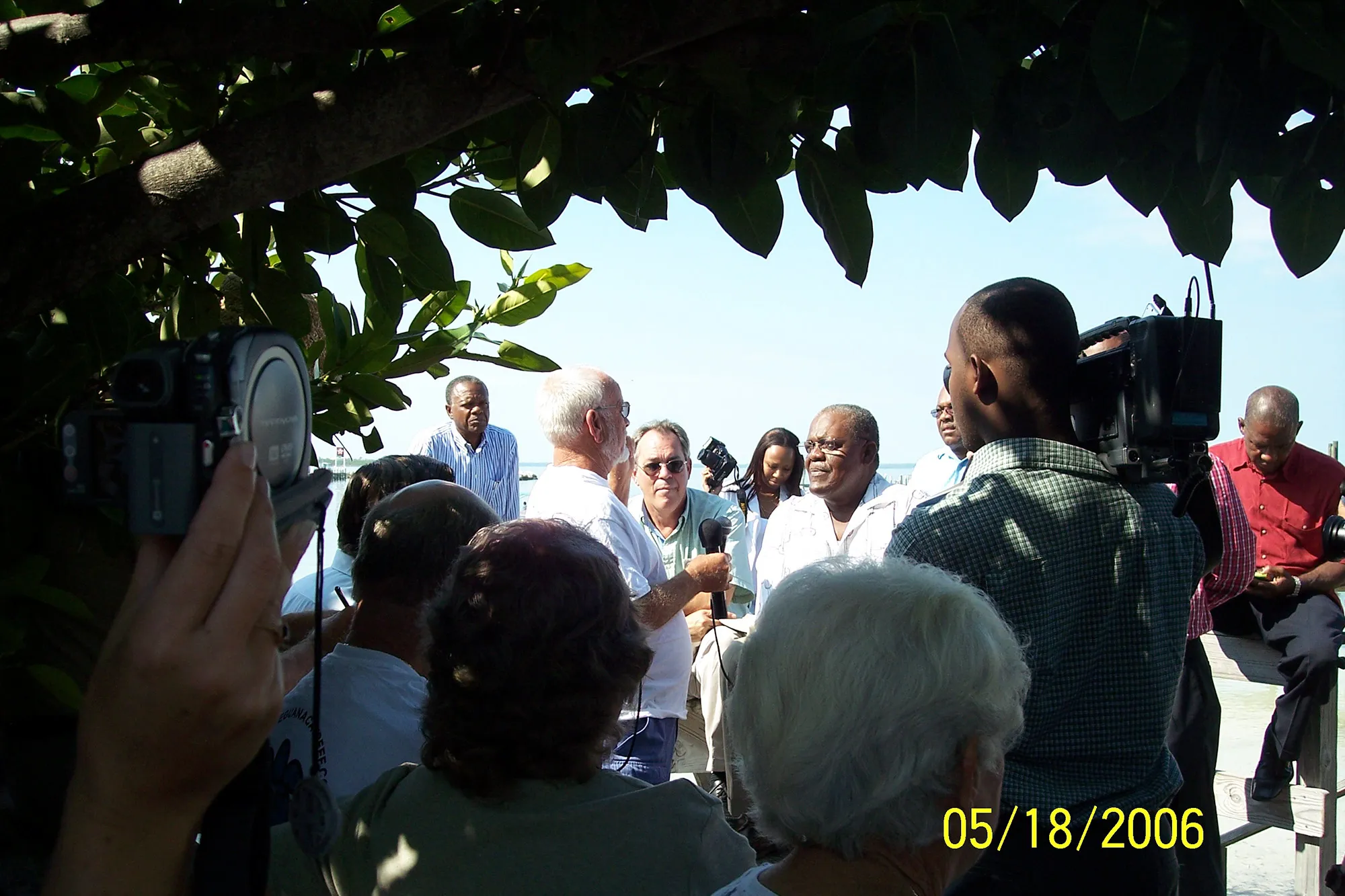 Former Prime Minister Hubert Ingraham speaks with residents and news cameras on Great Guana Cay in 2006