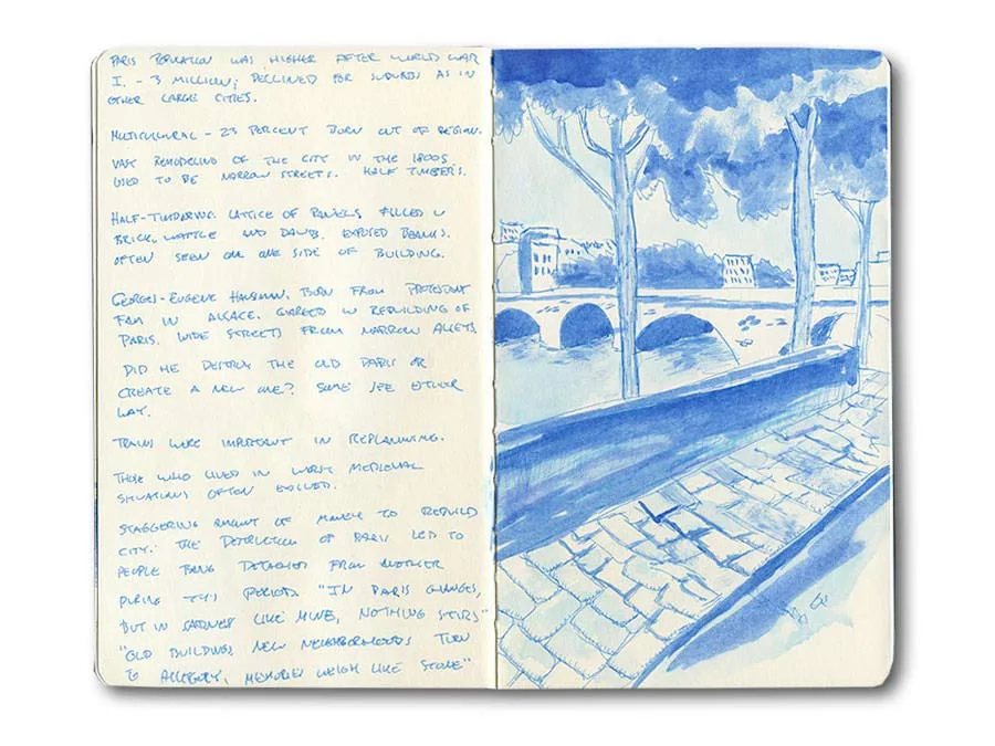 A blue-wash watercolor page from a Paris Moleskine sketch journal