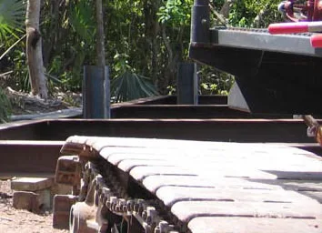 Foreigner-owned machinery, like tanks, stand ready to plow through Guana Cay's heritage