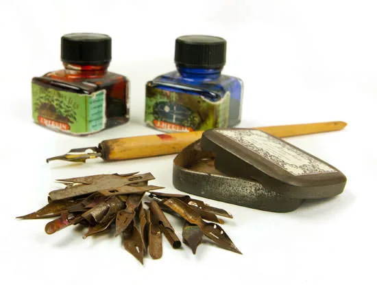 Nib pens, ink and watercolors packed for travel