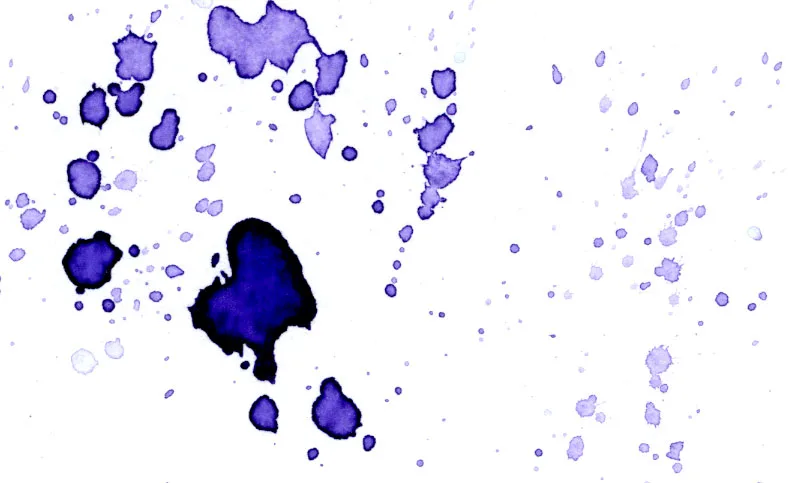 Splatters of Winsor violet watercolor paint.